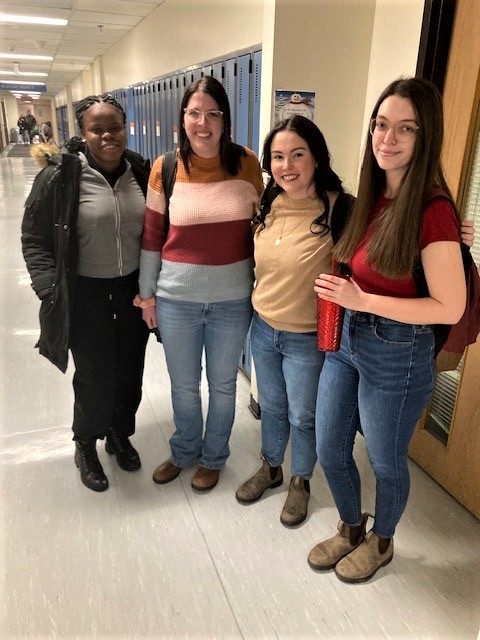 students standing in hallway